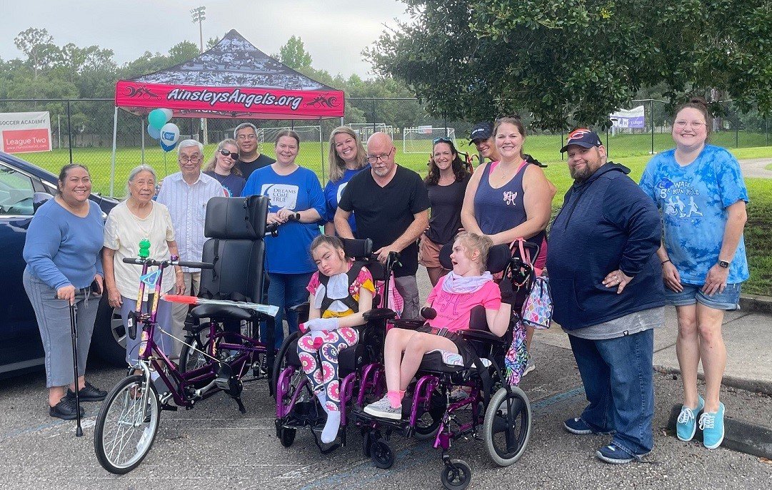 Dreams Come True surprised 18-year-old Siobhan with her new Freedom Concept tricycle during a special gathering at Losco Regional Park in Mandarin. Siobhan’s dream was sponsored by Berkshire Hathaway HomeServices Florida Network Realty.